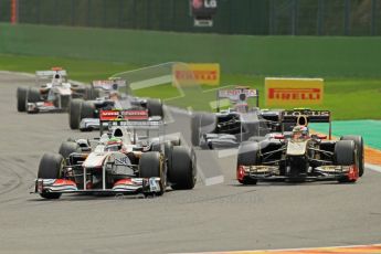 © Octane Photographic Ltd. 2011. Formula One Belgian GP – Spa – Sunday 28th August 2011 – Race. Perez and Petrov still fighting it out after a full lap of action. Digital Reference : 0168cb1d0823