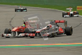 © Octane Photographic Ltd. 2011. Formula One Belgian GP – Spa – Sunday 28th August 2011 – Race. Jenson Button takes Felipe Massa through Bus Stop. Digital Reference : 0168cb1d0898
