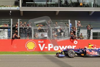 © Octane Photographic Ltd. 2011. Formula One Belgian GP – Spa – Sunday 28th August 2011 – Race. The Red Bull Racing mechanics celebrate as Mark Webber passes them after coming 3rd. Digital Reference : 0168cb7d0989