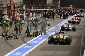 © Octane Photographic Ltd. 2011. Formula One Belgian GP – Spa – Sunday 28th August 2011 – Race. Heikki Kovalainen gets a thumbs up from the Team Lotus pit crew as he cruises to Parc Ferme. Digital Reference : 0168lw7d0694