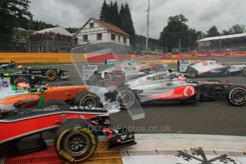 © Octane Photographic Ltd. 2011. Formula One Belgian GP – Spa – Sunday 28th August 2011 – Race. Paul di Resta in his Force India tags the back of Jenson Button's McLaren at the 1st corner on the opening lap. Digital Reference : 0168lw7d8529