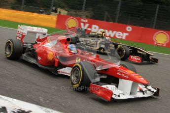 © Octane Photographic Ltd. 2011. Formula One Belgian GP – Spa – Sunday 28th August 2011 – Race. Fernando Alonso slides past Vitaly Petrov into La Source hairpin. Digital Reference : 0168lw7d9251