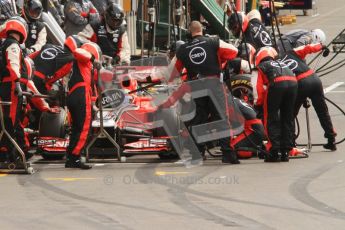 © Octane Photographic Ltd. 2011. Formula One Belgian GP – Spa – Sunday 28th August 2011 – Race. The Virgin Racing pit crew leap into action. Digital Reference : 0168lw7d9361