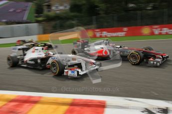 © Octane Photographic Ltd. 2011. Formula One Belgian GP – Spa – Sunday 28th August 2011 – Race. Button joins in the Perez/Petrov scrap. Digital Reference : 0168lw7d9536