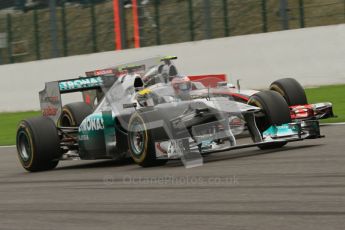 © Octane Photographic Ltd. 2011. Formula One Belgian GP – Spa – Sunday 28th August 2011 – Race. Jenson Button lining up Nico Rosberg. Digital Reference : 0168lw7d9742