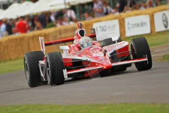 © Octane Photographic 2011. Dan Wheldon Taking a Chip Ganissi car up the hill. Goodwood Festival of Speed, Thursday 30th June 2011. Digital Ref : 0097CB7D671