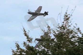 © Octane Photographic 2011 – Goodwood Revival 17th September 2011. Spitfires through the trees. Digital Ref : 0179CB1D4423