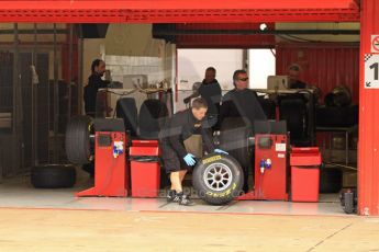 © Octane Photographic 2011. GP2 Official pre-season testing, Barcelona, Tuesday 19th April 2011. Pirelli tyre technicians at work. Digital Ref : 0052CB7D0054