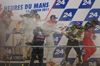 © Octane Photographic 2011. Le Mans finish line and podium - Sunday 11th June 2011. La Sarthe, France. Digital Ref : 0263cb7d1311