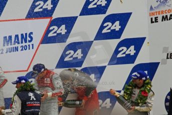 © Octane Photographic 2011. Le Mans finish line and podium - Sunday 11th June 2011. La Sarthe, France. Digital Ref : 0263lw7d8324