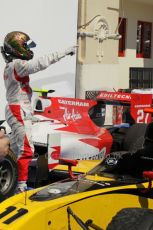 © Octane Photographic Ltd. 2011. European Formula1 GP, Saturday 25th June 2011. GP2 Race 1. Davide Valsecchi salutes his Caterham Team AirAsia team after his 3rd place. Digital Ref: 0085CB1D8307