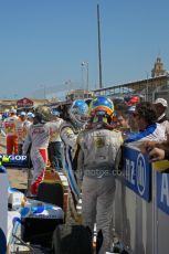 © Octane Photographic Ltd. 2011. European Formula1 GP, Saturday 25th June 2011. GP2 Race 1. Romain Grosjean, Giedo Van der Garde and Davide Valsecchi greeting the DAMS, Barwa Addax Team, and Caterham Team AirAsia crews after the race. Digital Ref: 0085CB1D8316