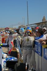 © Octane Photographic Ltd. 2011. European Formula1 GP, Saturday 25th June 2011. GP2 Race 1. Romain Grosjean, Giedo Van der Garde and Davide Valsecchi greeting the DAMS, Barwa Addax Team, and Caterham Team AirAsia crews after the race. Digital Ref:  0085CB1D8316