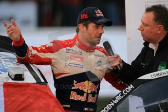 © North One Sport Ltd 2011 / Octane Photographic Ltd 2011. 13th November 2011 Wales Rally GB, Podium. Newly Crowned 8 times champions Sebastien Loeb being interviewed on the podium. Digital Ref : 0201cb1d9844