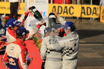 © North One Sport Ltd.2011/Octane Photographic Ltd. WRC Germany – Final Podium - Sunday 21st August 2011. Carlos Corral gets a bottle of champaign down the back of his neck from Daniel Sordo. Digital Ref : 0153CB1D6504