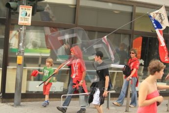 © North One Sport Ltd.2011/Octane Photographic Ltd. WRC Germany – Final Podium - Sunday 21st August 2011. Loeb fan walks back through town after teh podium ceremony. Digital Ref : 0153CB1D6532