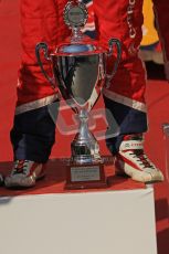 © North One Sport Ltd.2011/Octane Photographic Ltd. WRC Germany – Final Podium - Sunday 21st August 2011. 2nd place trophy at the feet of Sebastien Loeb. Digital Ref : 0153LW7D0119