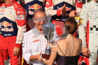 © North One Sport Ltd.2011/Octane Photographic Ltd. WRC Germany – Final Podium - Sunday 21st August 2011. Mossel Wine princess hands the winning constructors trophy to Olivier Quesnel. Digital Ref : 0153LW7D0134