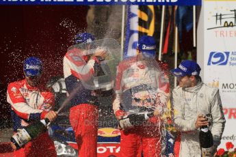 © North One Sport Ltd.2011/Octane Photographic Ltd. WRC Germany – Final Podium - Sunday 21st August 2011. Champaign fight - Sebastien Loeb, Sebastien Ogier, Julien Ingrassia and Daniel Sordo. Digital Ref : 0153LW7D0191