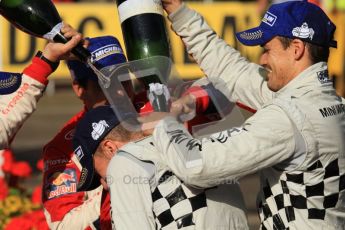 © North One Sport Ltd.2011/Octane Photographic Ltd. WRC Germany – Final Podium - Sunday 21st August 2011. Carlos Corral gets a bottle of champaign down the back of his neck from Daniel Sordo. Digital Ref : 0153LW7D0393