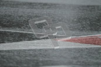 World © Octane Photographic 2011.  Formula 1 testing Saturday 12th March 2011 Circuit de Catalunya. Heavy rain on the pitlane entry. Digital ref : 0018CB1D4360