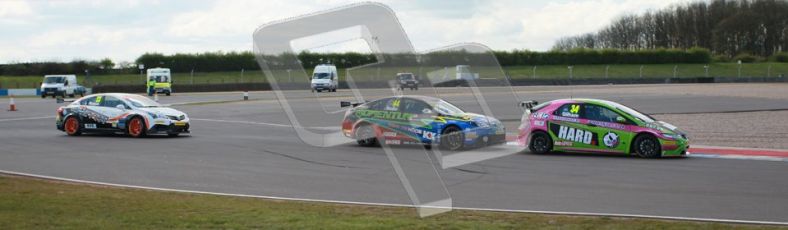 © Octane Photographic Ltd. BTCC - Round Two - Donington Park - Race 1. Sunday 15th April 2012. Matt Neal pushing Tony Gilham through the Fogatry Esses. Digital ref : 0295lw1d7777