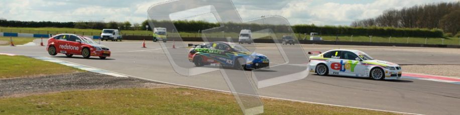 © Octane Photographic Ltd. BTCC - Round Two - Donington Park - Race 1. Sunday 15th April 2012. Rob Collard and Jason Plato and followed by a 3 wheeling Mat Jackson through the Esses. Digital ref : 0295lw1d7821