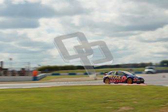 © Octane Photographic Ltd. BTCC - Round Two - Donington Park - Race 1. Sunday 15th April 2012. Andrew Jordan at speed through the Esses. Digital ref : 0295lw1d7910