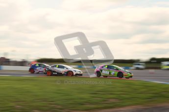 © Octane Photographic Ltd. BTCC - Round Two - Donington Park - Race 1. Sunday 15th April 2012. 3 into 1 does go, Tony Gilham, Adam Morgan and Jeff Smith battle through the Esses. Digital ref : 0295lw1d7971