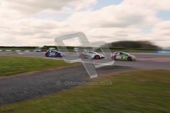 © Octane Photographic Ltd. BTCC - Round Two - Donington Park - Race 1. Sunday 15th April 2012. 3 into 1 does go, Tony Gilham, Adam Morgan and Jeff Smith battle through the Esses. Digital ref : 0295lw1d7976