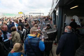 © Octane Photographic Ltd. BTCC - Round Two - Donington Park - Race 1. Sunday 15th April 2012. The post race crowds gather in the pitlane. Digital ref : 0295lw1d8048