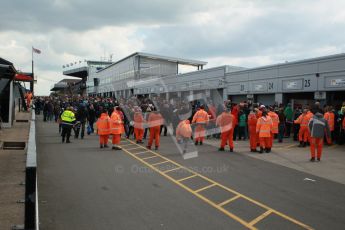 © Octane Photographic Ltd. BTCC - Round Two - Donington Park - Race 1. Sunday 15th April 2012. The post race crowds gather in the pitlane. Digital ref : 0295lw1d8063