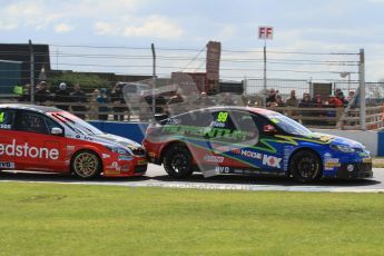 © Octane Photographic Ltd. BTCC - Round Two - Donington Park - Race 1. Sunday 15th April 2012. Jason Plato gets leaned on by Mat Jackson under braking into the Esses. Digital ref : 0295lw7d3558