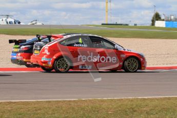 © Octane Photographic Ltd. BTCC - Round Two - Donington Park - Race 1. Sunday 15th April 2012. Jason Plato runs wide over the Esses chicane under pressure from Mat Jackson. Digital ref : 0295lw7d3572