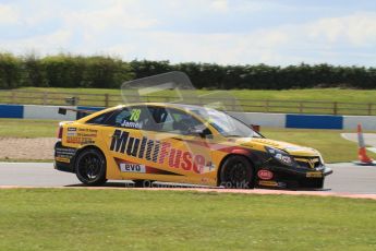 © Octane Photographic Ltd. BTCC - Round Two - Donington Park - Race 1. Sunday 15th April 2012. Chris James lifts a rear wheel under braking for the Esses in his Vauxhall Vectra. Digital ref : 0295lw7d3609