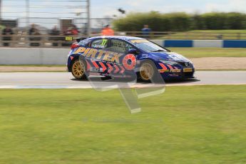 © Octane Photographic Ltd. BTCC - Round Two - Donington Park - Race 1. Sunday 15th April 2012. Andrew Jordan lifts a rear wheel under braking into the Esses. Digital ref : 0295lw7d3847