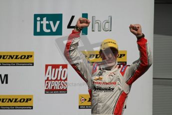 © Octane Photographic Ltd. BTCC - Round Two - Donington Park - Race 1. Sunday 15th April 2012. Matt Neal cheers with the crowd as he enteres the podium. Digital ref : 0295lw7d4131