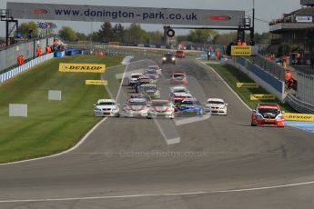 © Octane Photographic Ltd. BTCC - Round Two - Donington Park - Race 2. Sunday 15th April 2012. Tom Onslow-Cole puts 2 wheels on the grass in his eBay motors BMW 320si as race 2 gets underway. Digital ref : 0296lw7d4374