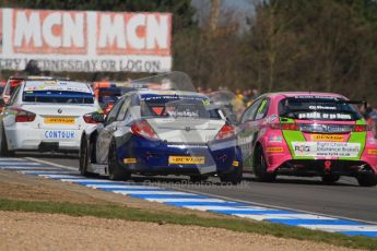 © Octane Photographic Ltd. BTCC - Round Two - Donington Park - Race 2. Sunday 15th April 2012. The pack head into Hollywood. Digital ref : 0296lw7d4423