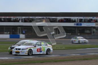 © Octane Photographic Ltd. BTCC - Round Two - Donington Park - Race 2. Sunday 15th April 2012. Tom Onslow-Cole and Tony Gillham go toe to tow out of Redgate. Digital ref : 0296lw7d5011