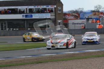 © Octane Photographic Ltd. BTCC - Round Two - Donington Park - Race 2. Sunday 15th April 2012. Mat Neal leads Tony Hughes out of Redgate. Digital ref : 0296lw7d5042