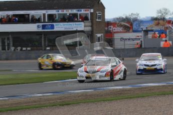 © Octane Photographic Ltd. BTCC - Round Two - Donington Park - Race 2. Sunday 15th April 2012. Mat Neal leads  Tony Hughes out of Redgate. Digital ref : 0296lw7d5042