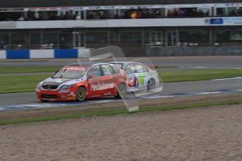 © Octane Photographic Ltd. BTCC - Round Two - Donington Park - Race 2. Sunday 15th April 2012. Liam Griffin and Rob Collard racing hard through Redgate. Digital ref : 0296lw7d5075