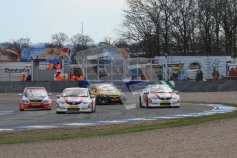 © Octane Photographic Ltd. BTCC - Round Two - Donington Park - Race 2. Sunday 15th April 2012. Gordon Shedden leading a fight through Redgate, Digital ref : 0296lw7d5097