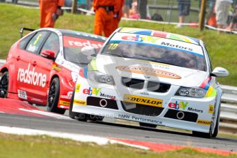 © Octane Photographic Ltd./Chris Enion. British Touring Car Championship – Round 6, Snetterton, Saturday 11th August 2012. Free Practice 2. Nick Foster - eBay Motors, BMW 320si E90 and Aron Smith - Redstone Racing, Ford Focus. Digital Ref : 0453ce1d0009