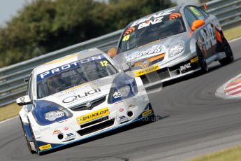 © Octane Photographic Ltd./Chris Enion. British Touring Car Championship – Round 6, Snetterton, Sunday 12th August 2012. Race 1. Daniel Welch - Welch Motorsport, Proton Persona and Lea Wood - BINZ Racing, Vauxhall Vectra. Digital Ref : 0455ce1d0119
