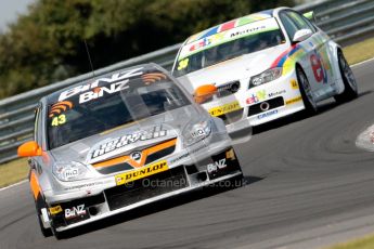 © Octane Photographic Ltd./Chris Enion. British Touring Car Championship – Round 6, Snetterton, Sunday 12th August 2012. Race 1. Lea Wood - BINZ Racing, Vauxhall Vectra and Tom Onslow-Cole - eBay Motors, BMW 320si E90. Digital Ref : 0455ce1d0120