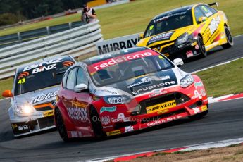 © Octane Photographic Ltd./Chris Enion. British Touring Car Championship – Round 6, Snetterton, Sunday 12th August 2012. Race 2. Mat Jackson - Redstone Racing, Ford Focus, Lea Wood - BINZ Racing, Vauxhall Vectra and Dave Newsham - Team ES Racing.com, Vauxhall Vectra. Digital Ref : 0456ce1d0223