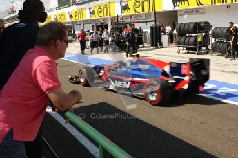 © 2012 Octane Photographic Ltd. Hungarian GP Hungaroring - Saturday 28th July 2012 - GP2 Race 1 - iSport International - Jonathan palmer watches his son head doen the pitlane during the Hungarian GP2 Feature race. Digital ref : 0431CB7D7858