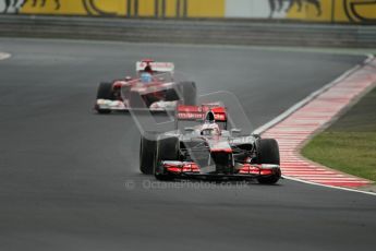 © 2012 Octane Photographic Ltd. Hungarian GP Hungaroring - Friday 27th July 2012 - F1 Practice 2. McLaren MP4/27 - Jenson Button checking to see the gap back to Fernando Alonso's Ferrari F2012. Digital Ref : 0426lw1d5861